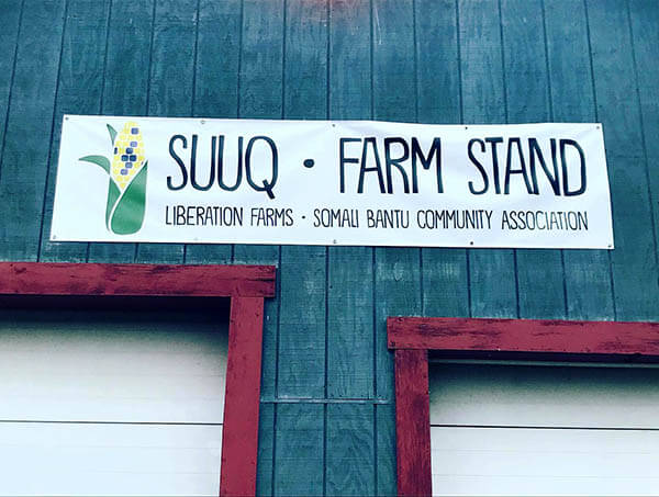 The sign for the Suuq Farm Stand